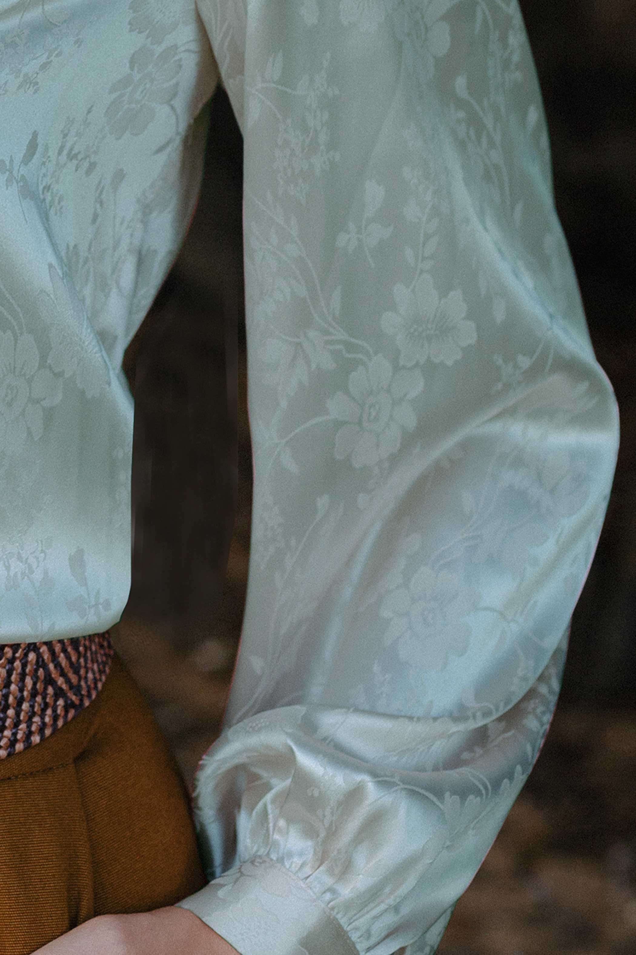 Mint green jacquard V-neck blouse