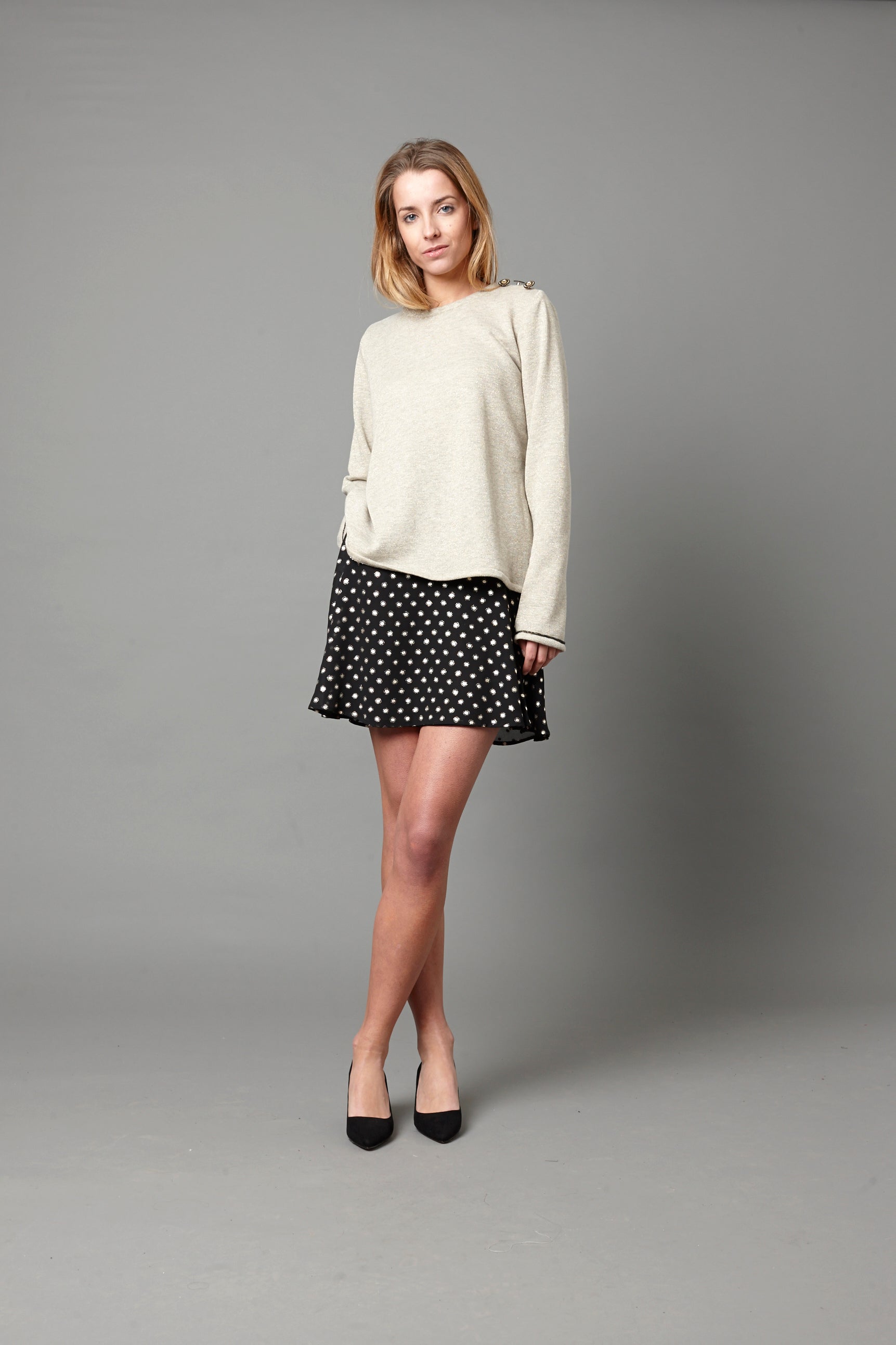 Jersey tipo sudadera con lurex dorado y cordón en espalda