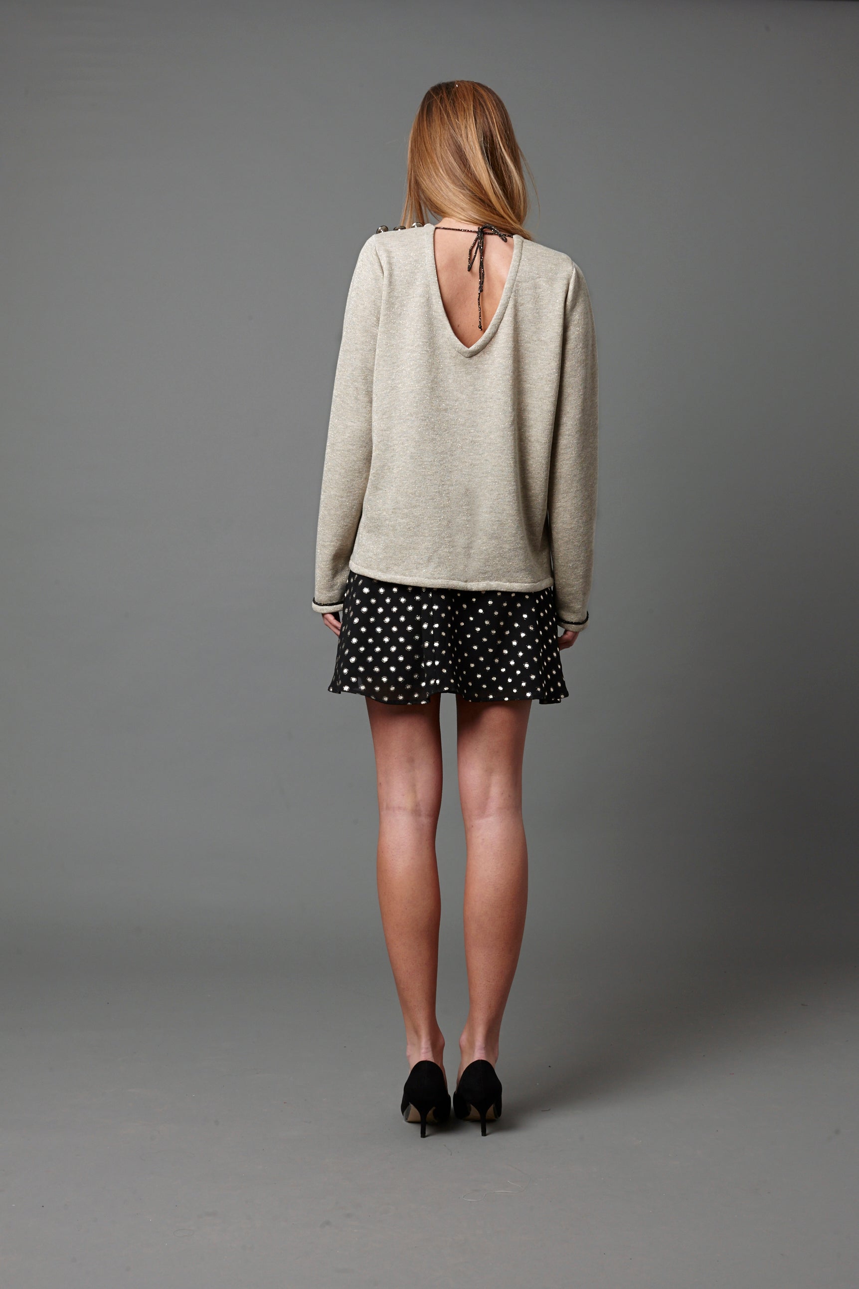 Jersey tipo sudadera con lurex dorado y cordón en espalda