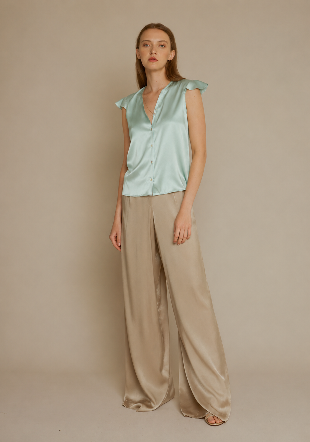 Green silk blouse