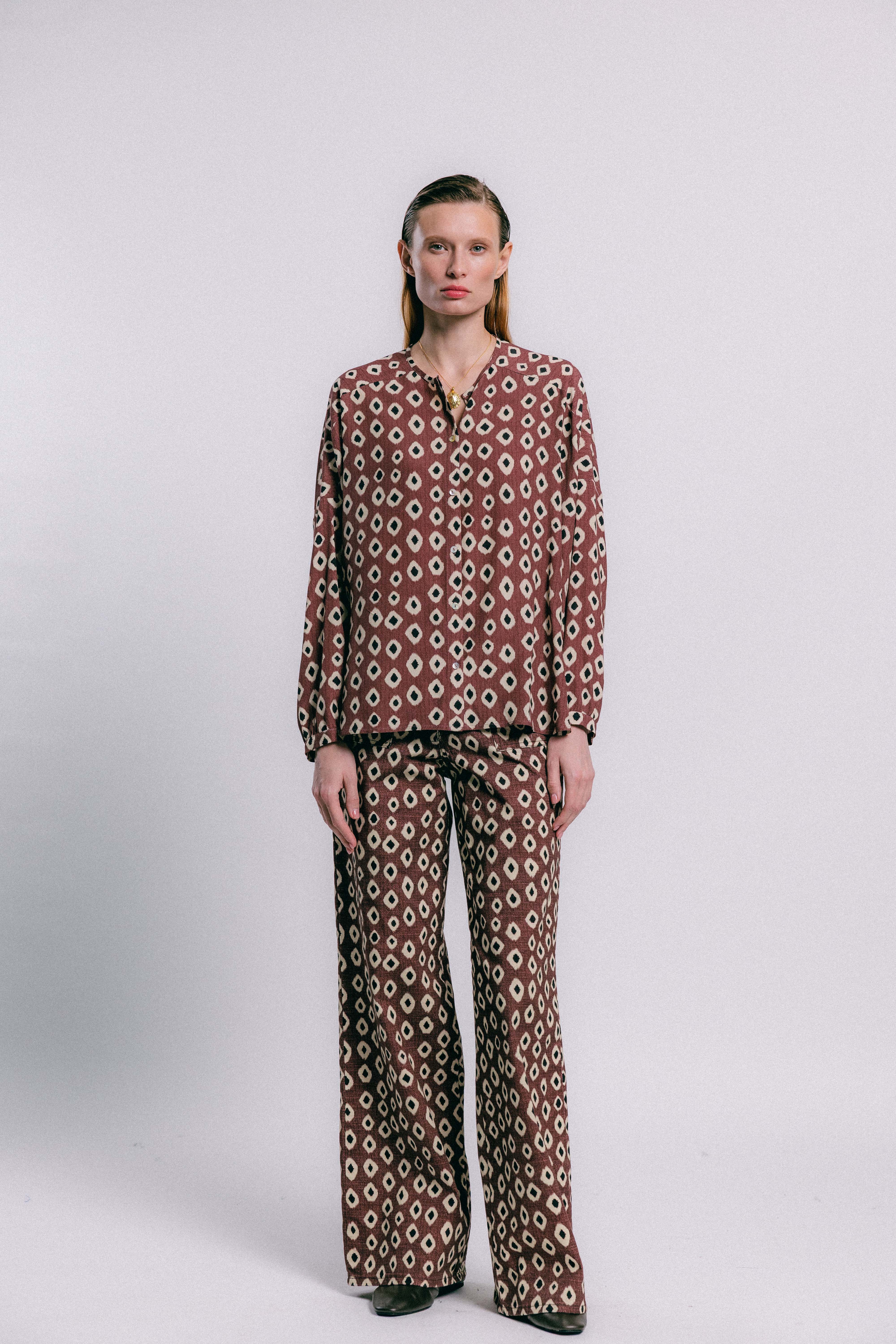 Blusa flux geométrica