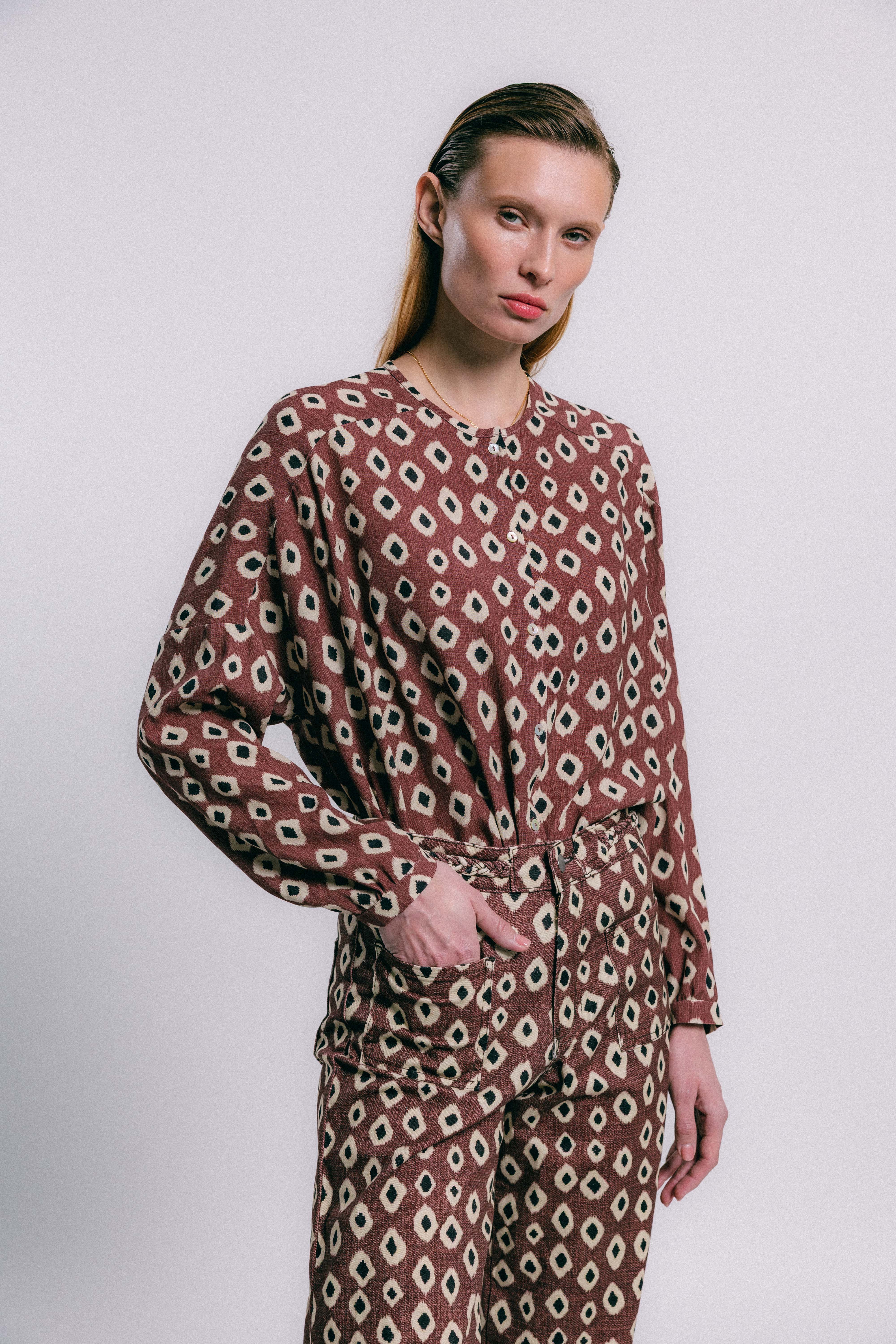 Blusa flux geométrica