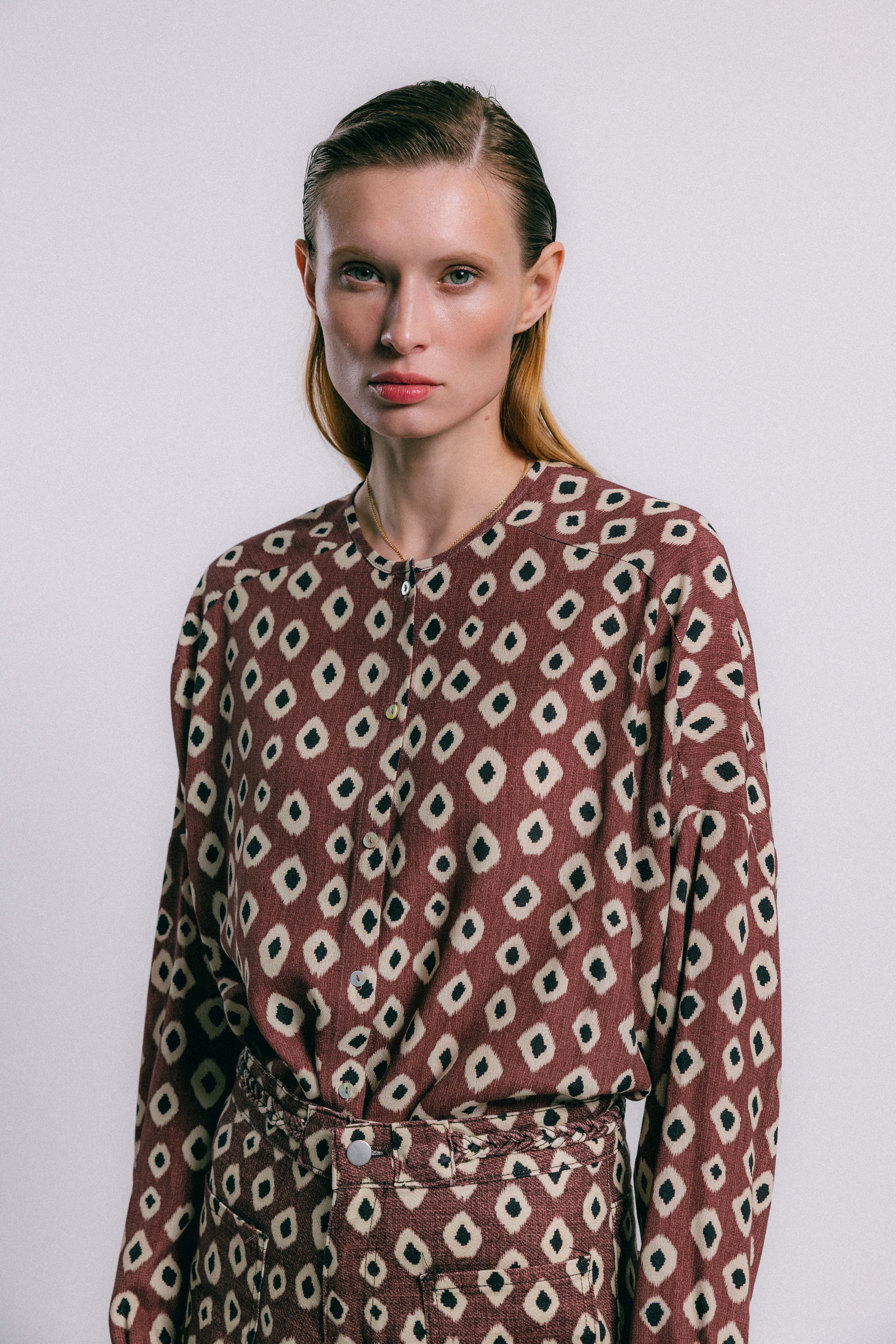 Blusa flux geométrica