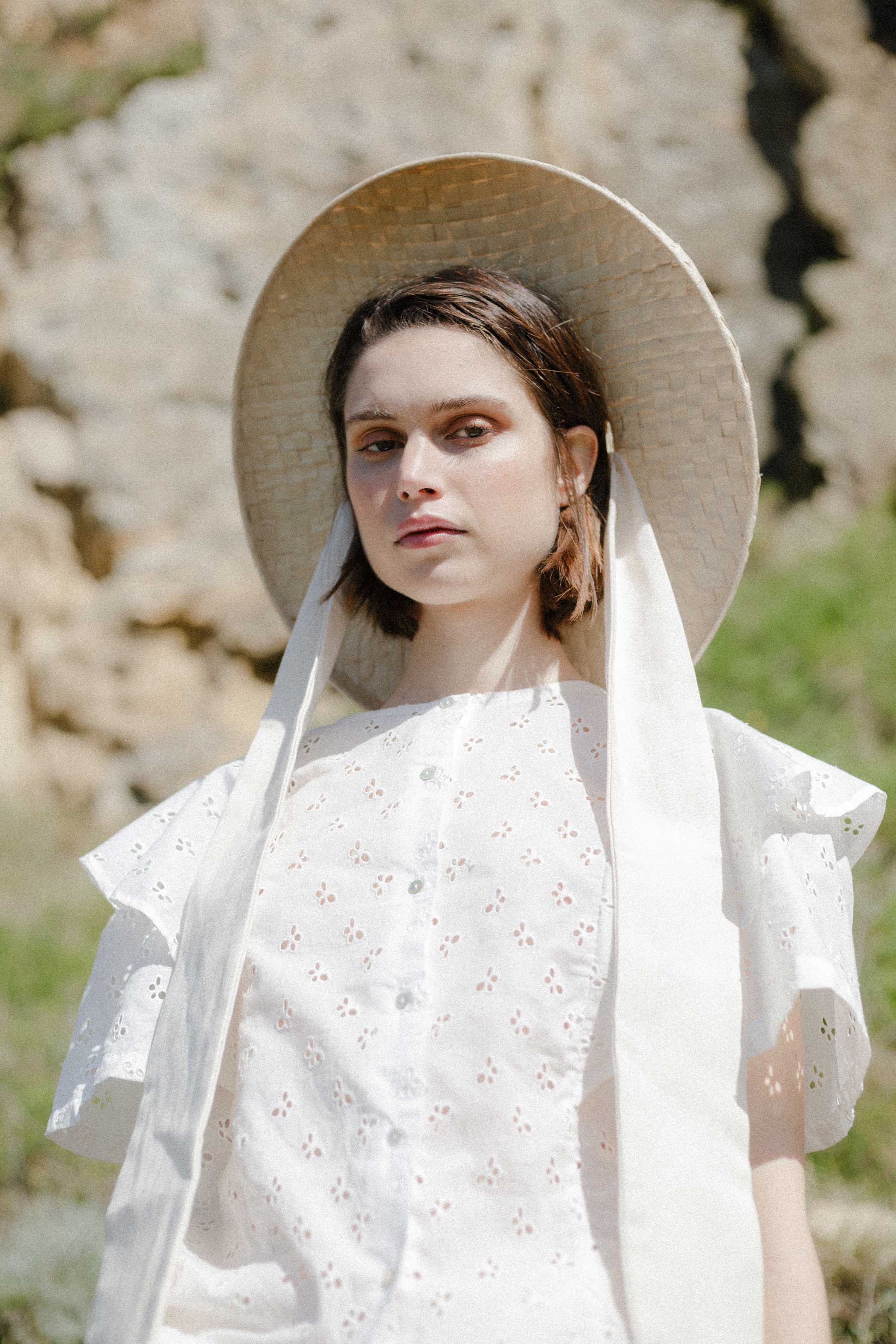 White embroidered cotton ruffle blouse