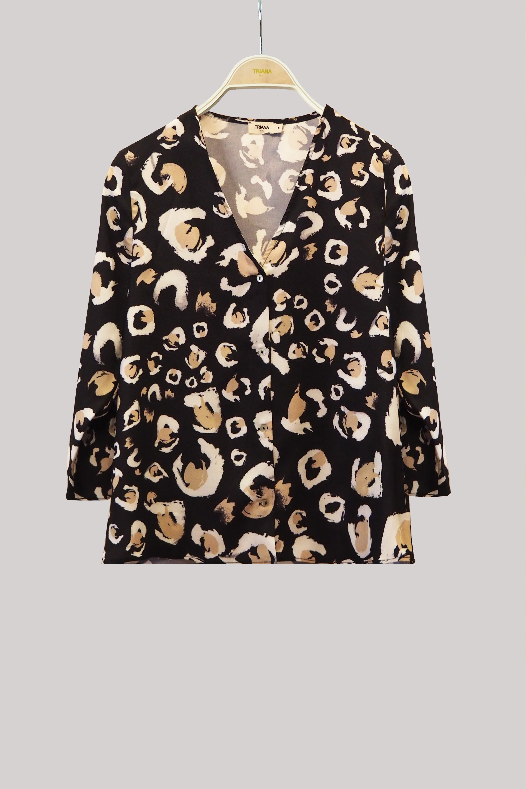 Blusa LONDON animal print negra camel