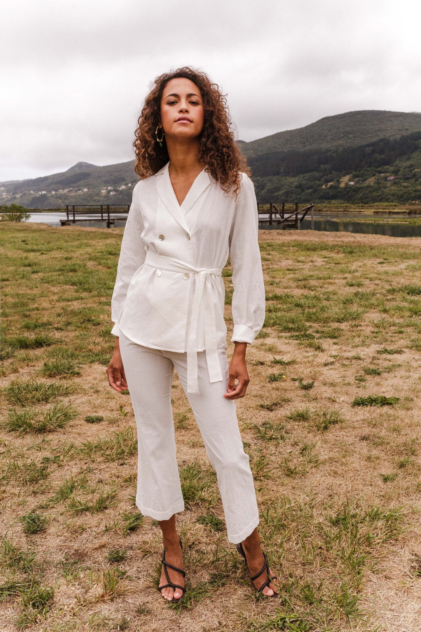 ROMA white flared trousers