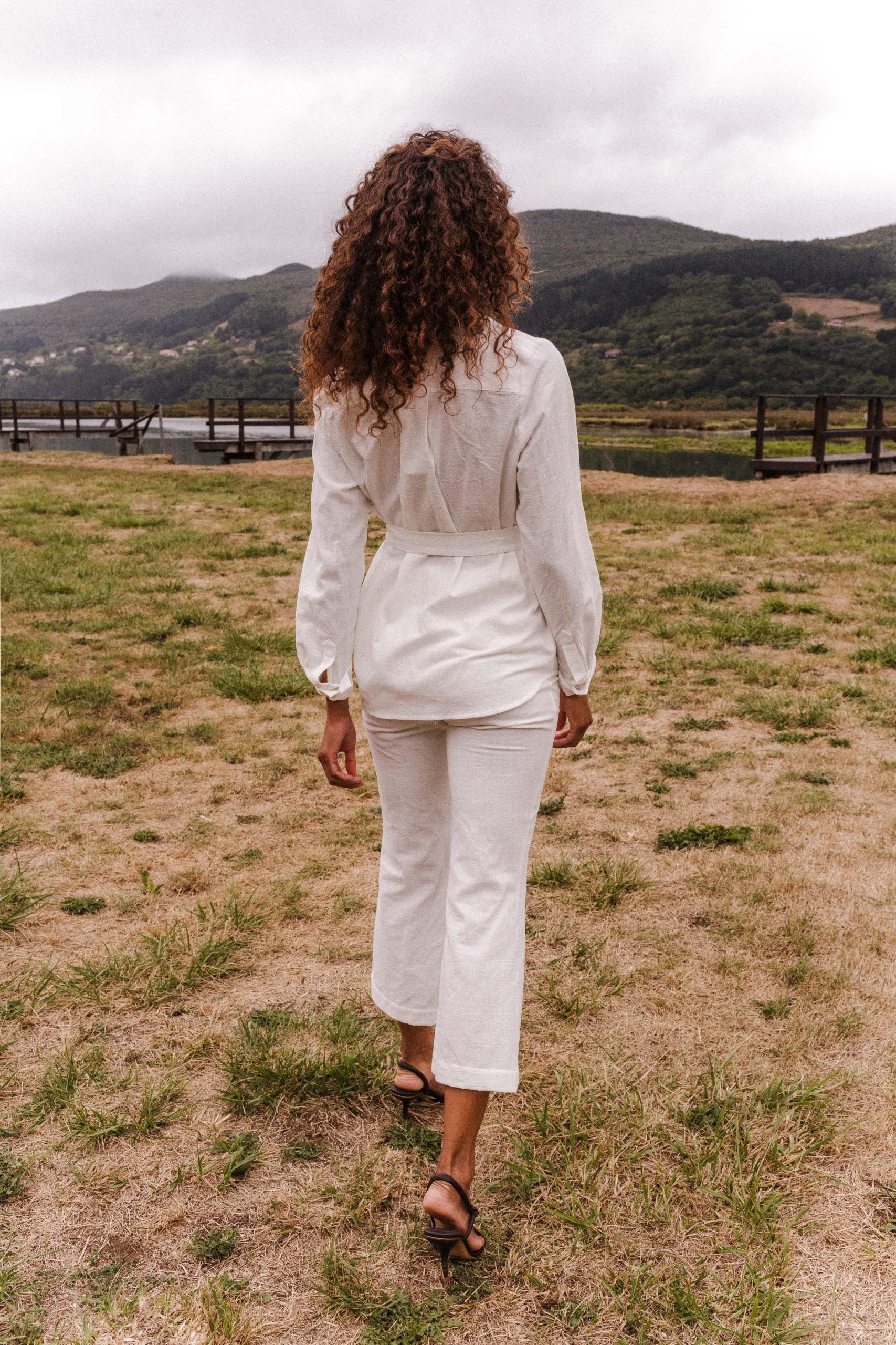 ROMA white flared trousers