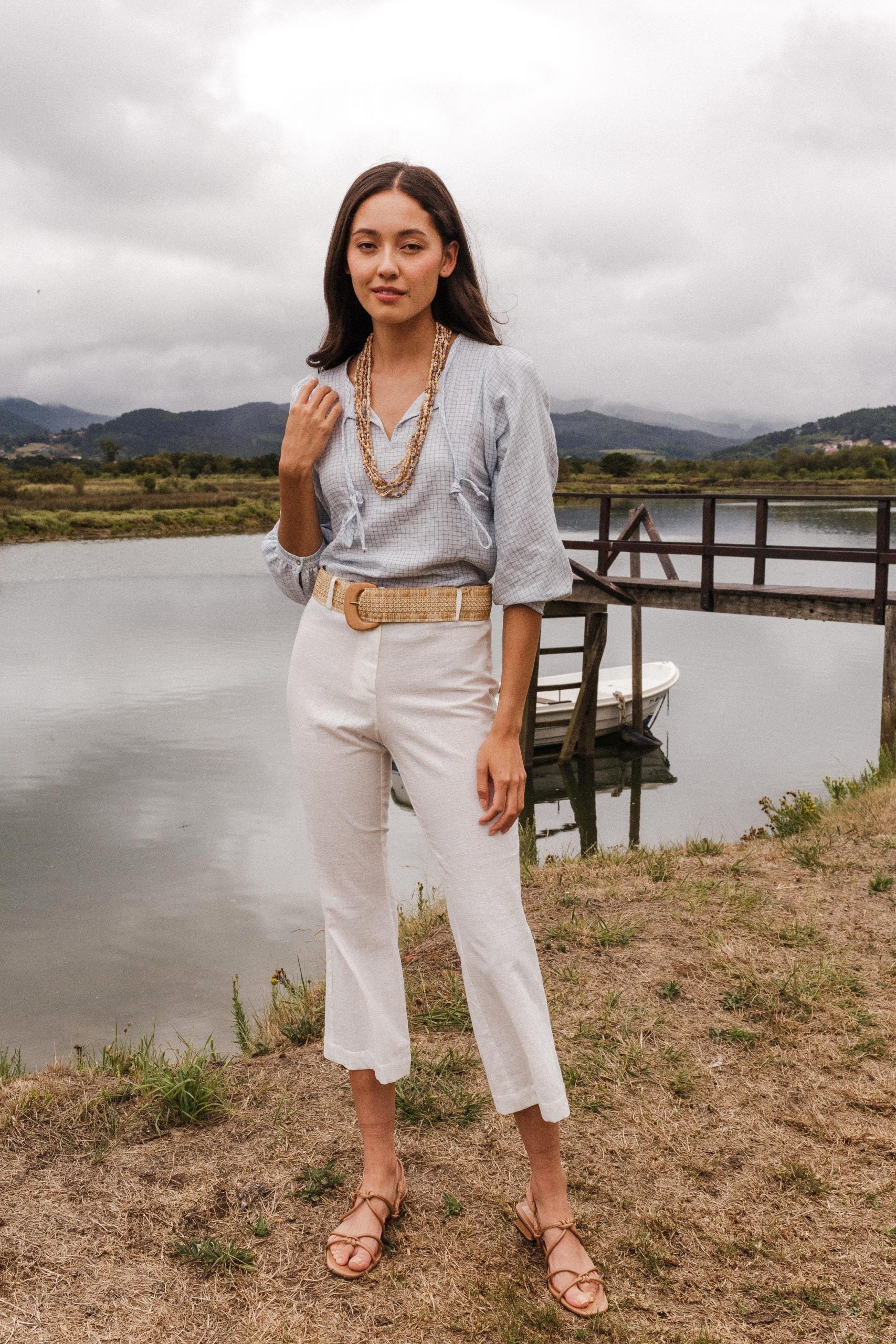 ROMA white flared trousers