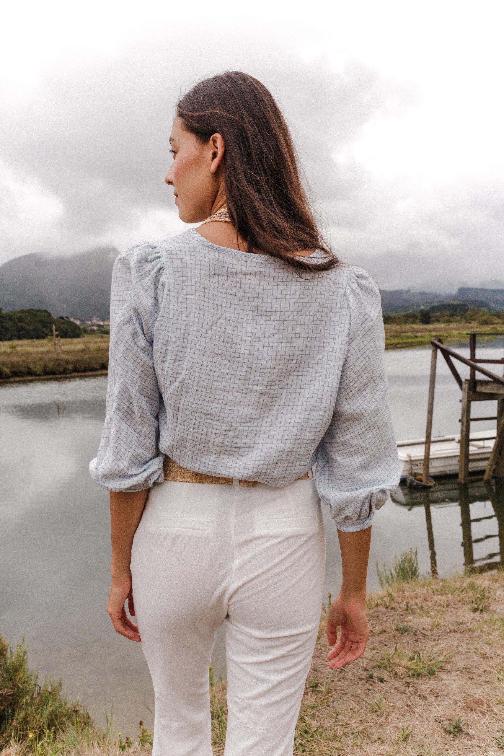 ROMA white flared trousers