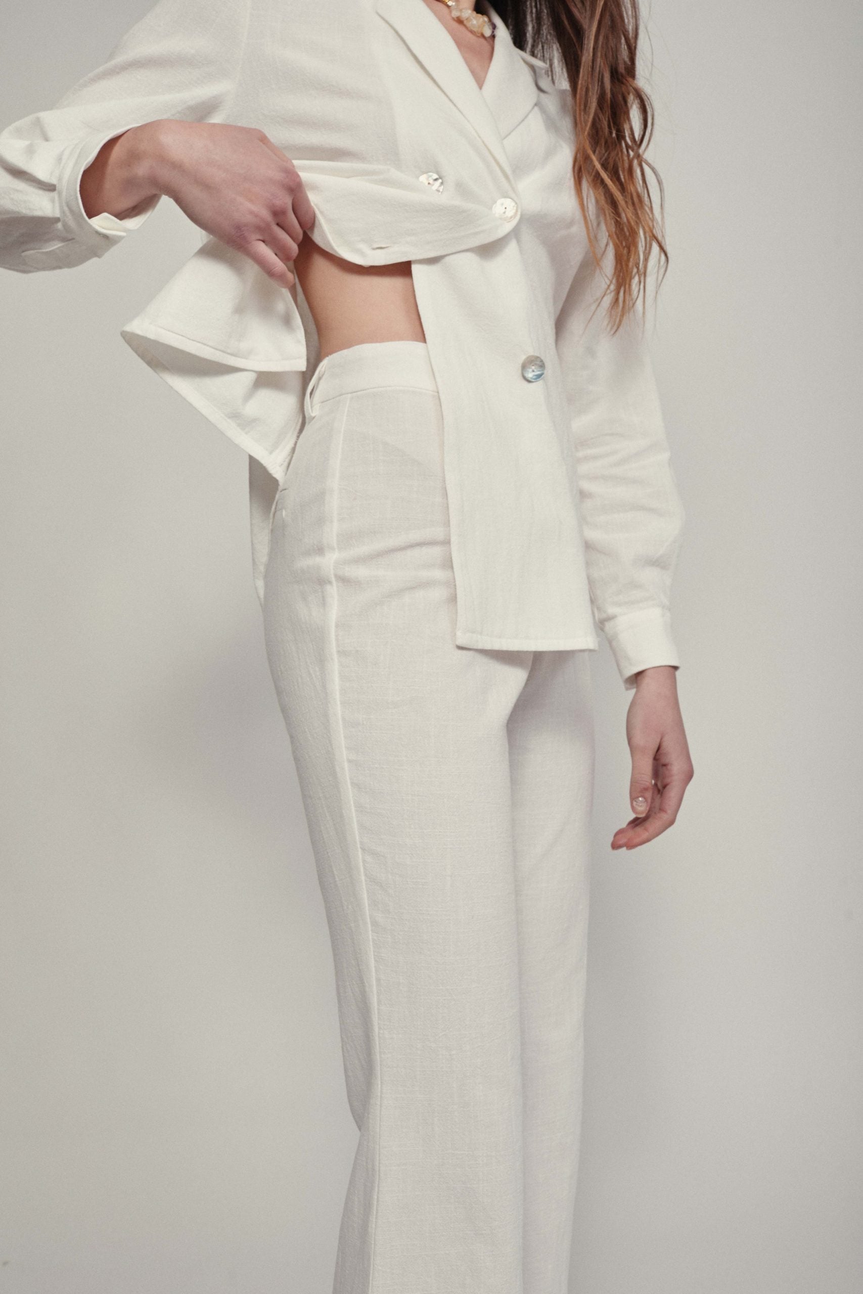 ROMA white flared trousers