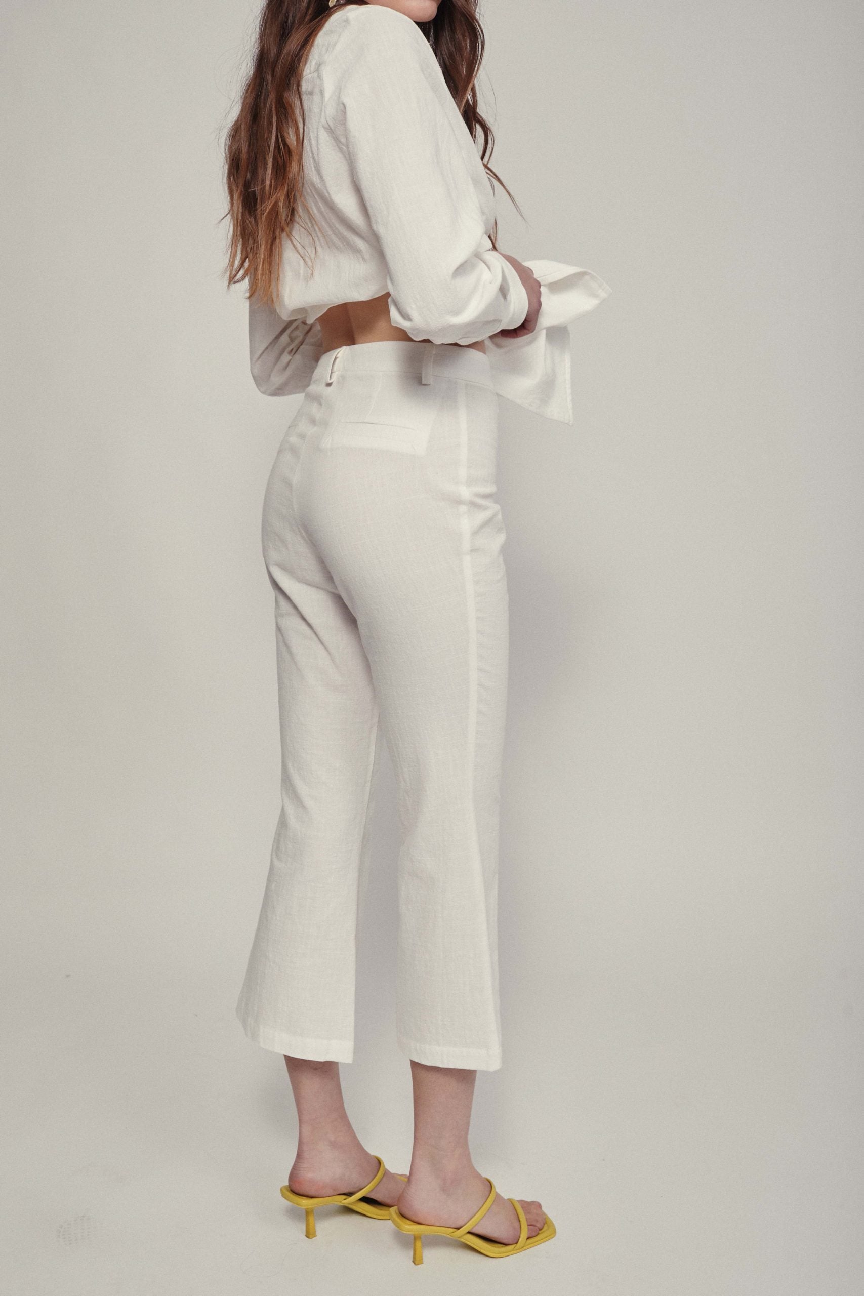 ROMA white flared trousers