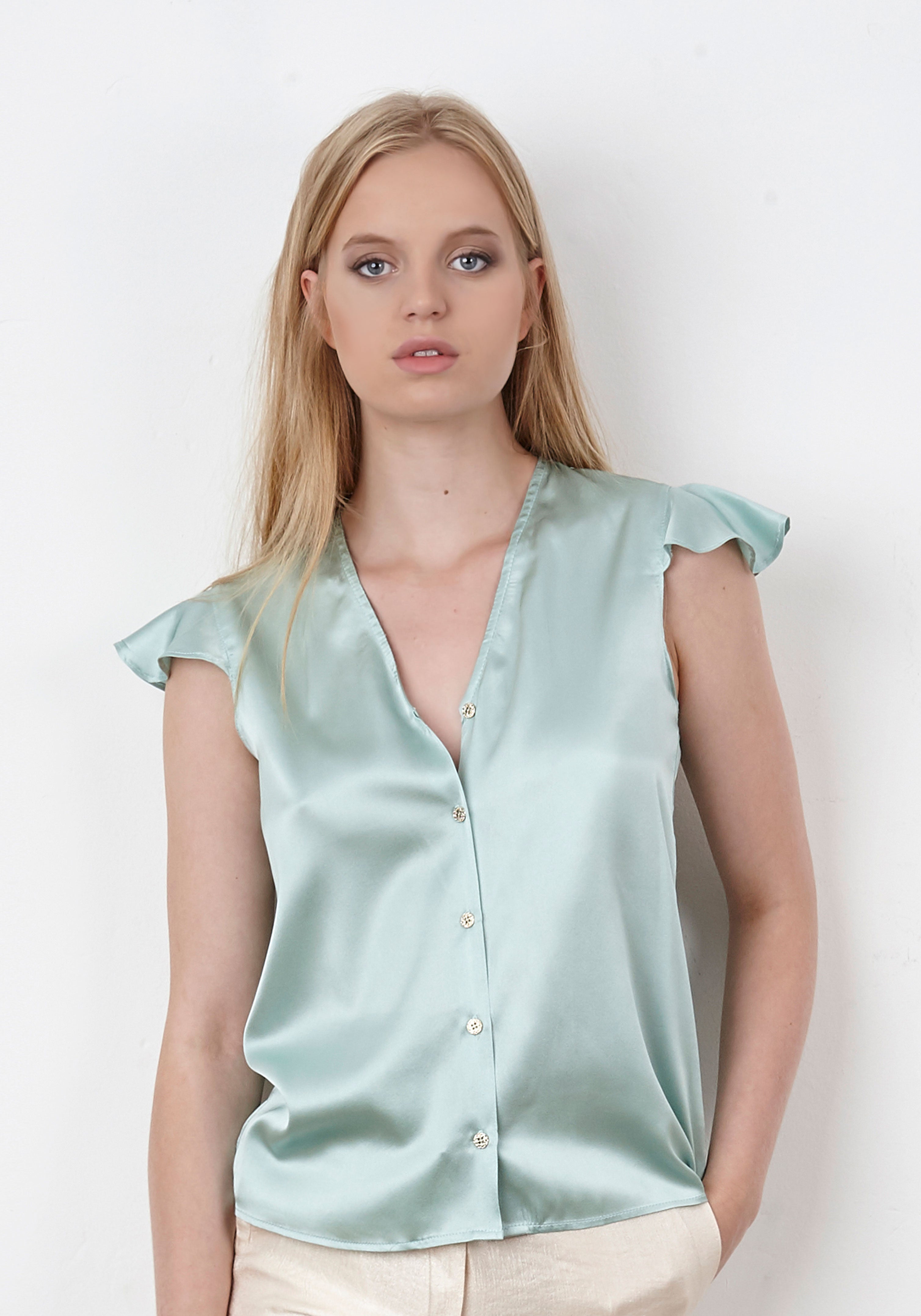 Green silk blouse